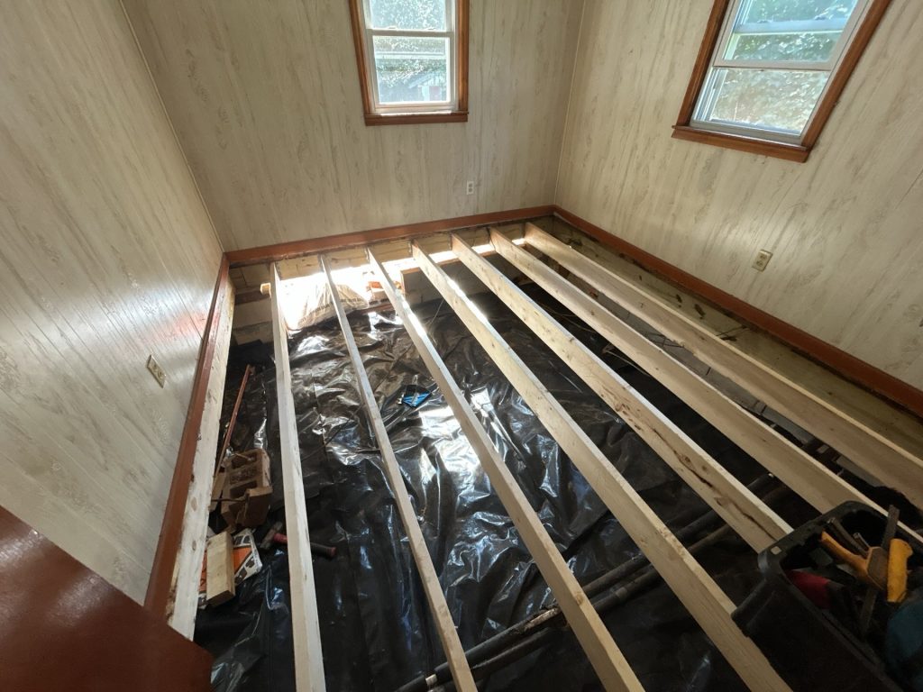 Whole floor reframing due to band damage on a home in Western North Carolina